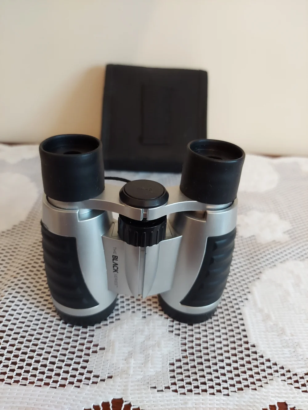 Silver and Black Compact Binoculars -